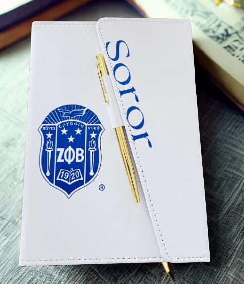 Zeta Phi Beta Refillable White/Royal Blue Sleek Flap Journal with Pen.