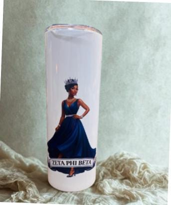 Zeta Phi Beta Royal Queen 20oz Tumbler includes a straw and a cleaning tool