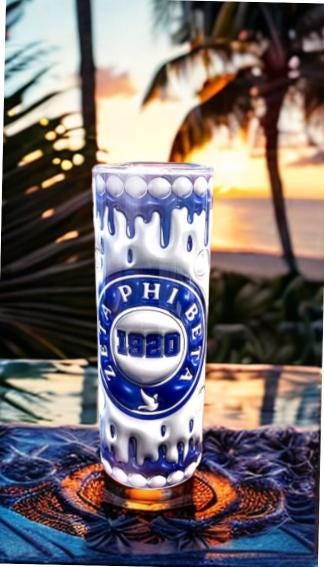 Zeta 20oz Tumbler includes straw and cleaning tool